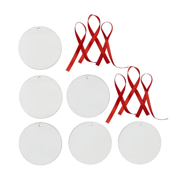 Seven blank, round, white ornaments with small holes at the top are arranged in two rows. Six red ribbons, looped for hanging, are placed above the ornaments on a white background.