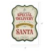 A festive sign reading “North Pole Express Special Delivery Delivered with care from Santa Packed with love” in vintage-style lettering, with green and gold borders. Sign measures 17 inches by 11 inches.