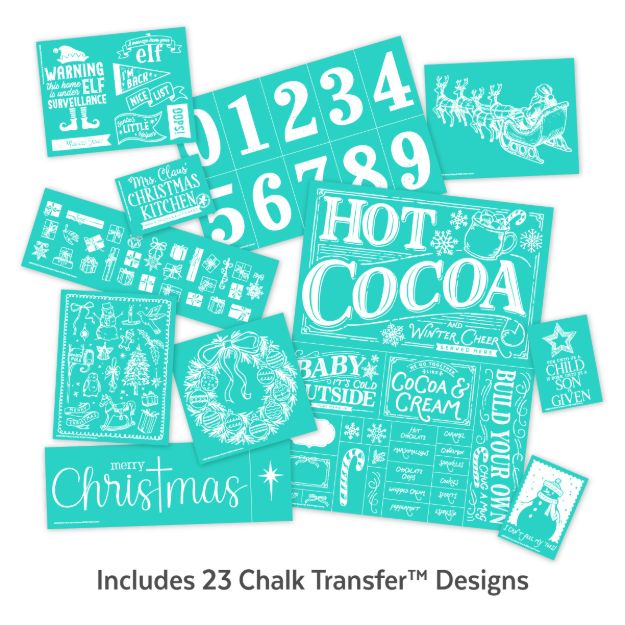 Assorted teal chalk transfer sheets with white Christmas designs, including numbers, “HOT COCOA,” snowflakes, Santa in a sleigh, and festive phrases. Text below reads “Includes 23 Chalk Transfer™ Designs.”.
