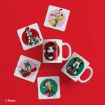 Two Disney mugs and six Disney character coasters are arranged on a red background. The mugs and coasters feature Mickey Mouse, Minnie Mouse, Goofy, Pluto, and Donald Duck in festive holiday outfits.