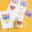 Ted Lasso-themed merchandise on a yellow surface, including a notebook, sticker sheets, a mug labeled “Garbage Water,” and a coaster reading “Hurt Free.” Items feature motivational quotes in colorful text.