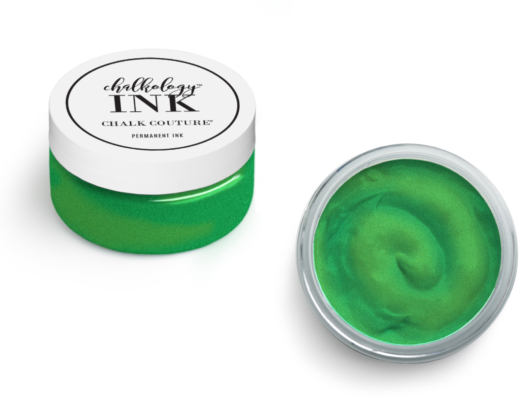 A small jar labeled “Chalkology Ink Chalk Couture Permanent Ink” with a white lid sits next to an open container showing smooth, bright green ink inside.