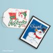 A Frosty the Snowman gift tag that reads “It Must Be Magic” and a framed print of Frosty the Snowman titled “The Original.”