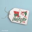 A white gift tag featuring an illustration of Frosty the Snowman with the text “It Must Be Magic” and “Frosty the Snowman.”